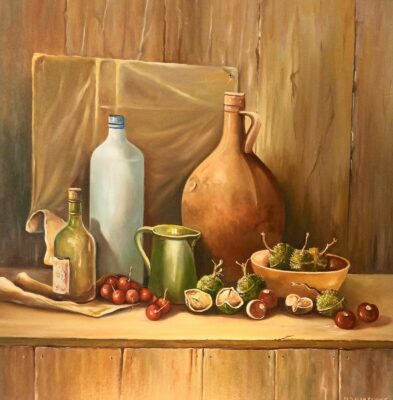 Still life with old jug and chestnuts.